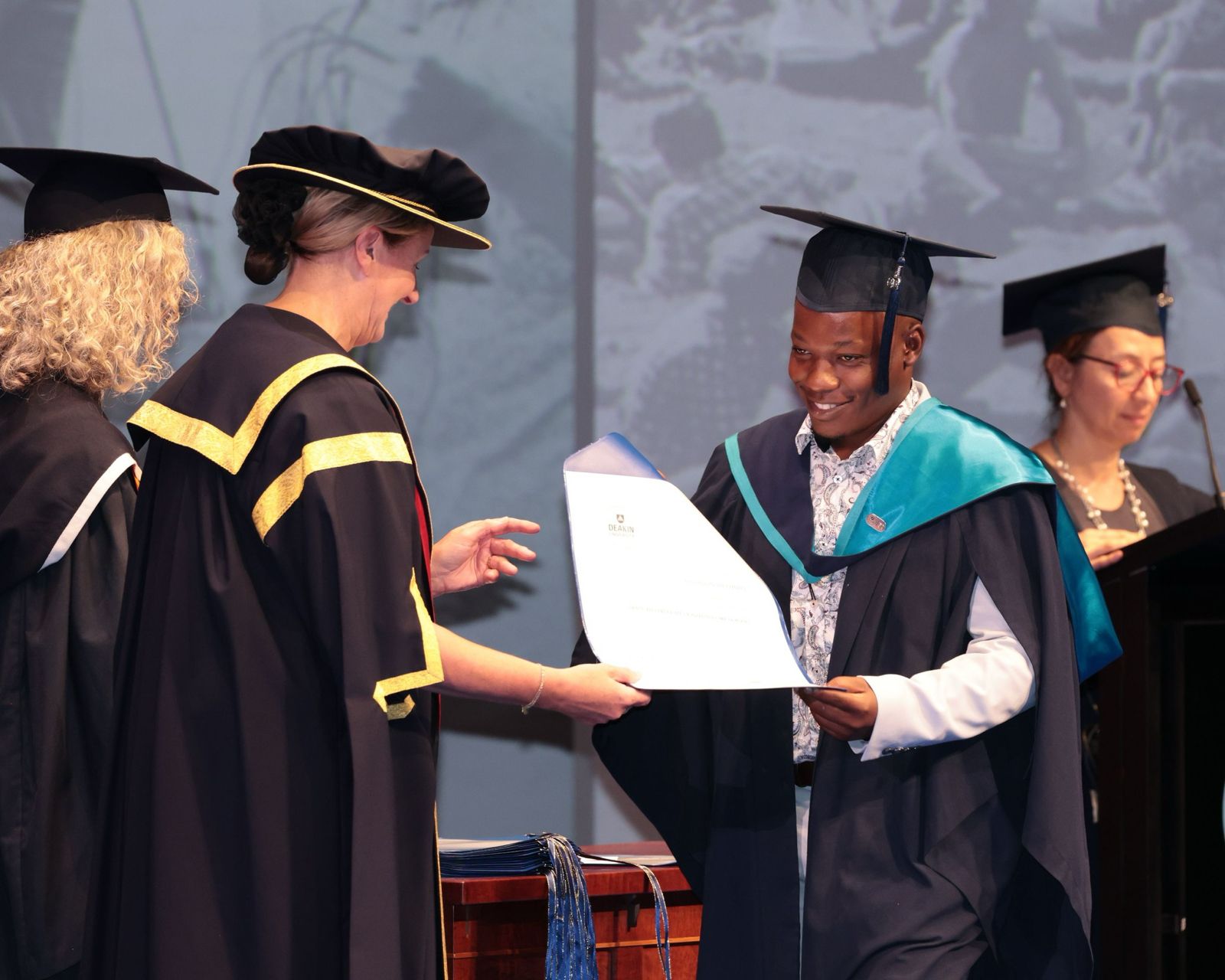 Solomon Ssettimba graduating from Deakin University
